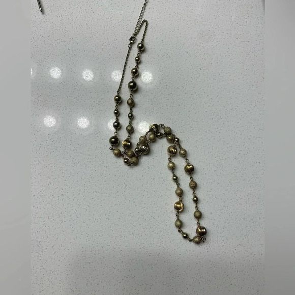 Vintage Monet Gold-Tone Alternating Textures Ball Beaded
Long Necklace Women’s - Picture 4 of 8